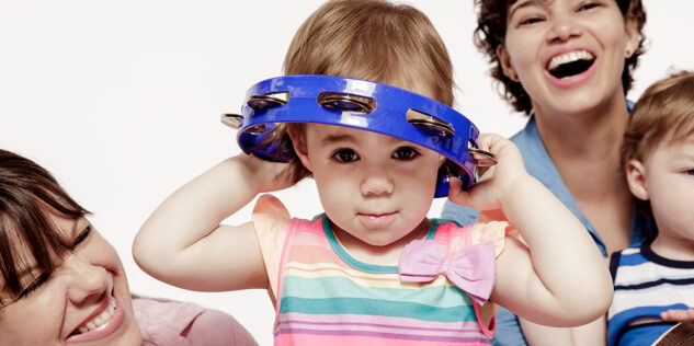 Child playing with sound toy