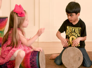 boy and girl playing banjo