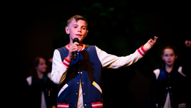 Boy Performing